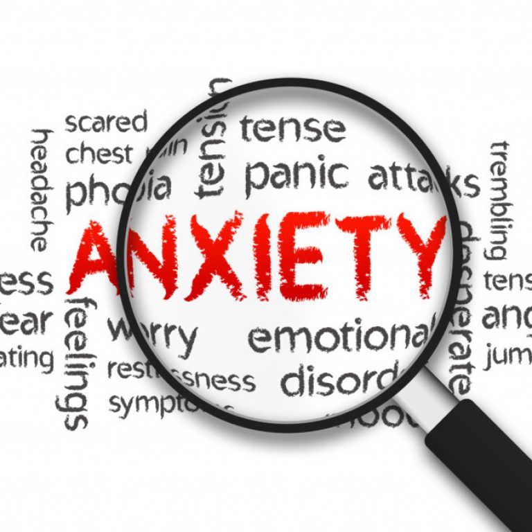 Magnified Anxiety word illustration on white background.