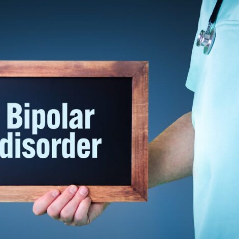 Bipolar disorder (manic depression). Doctor shows sign/board with wooden frame. Background blue