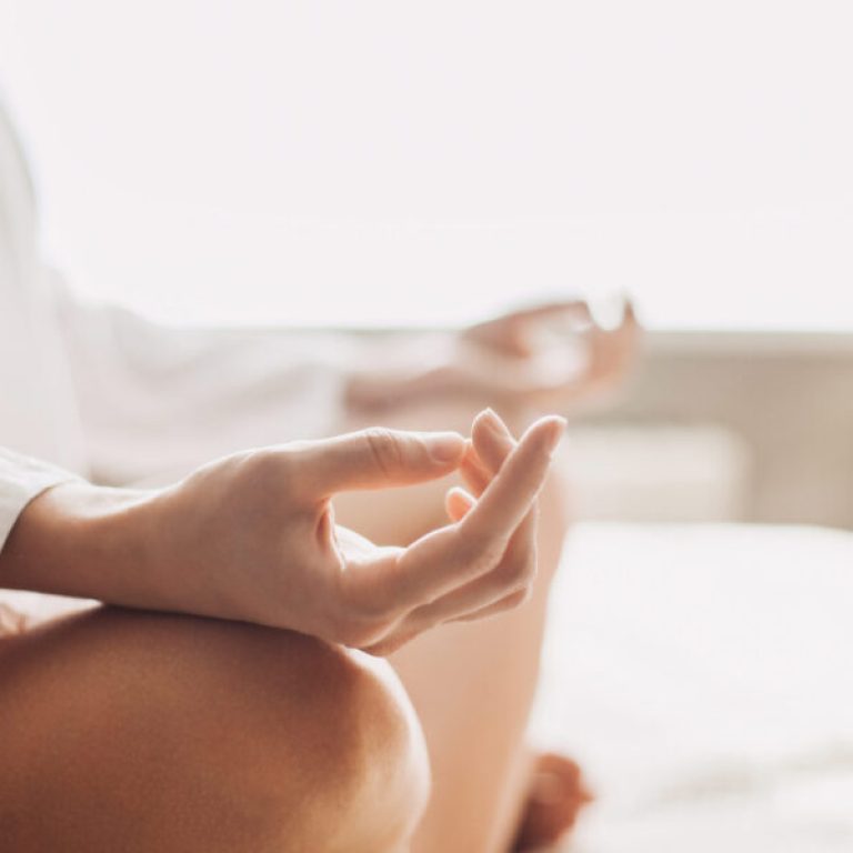 Yoga woman meditating and practicing yoga at home. Recreation, s